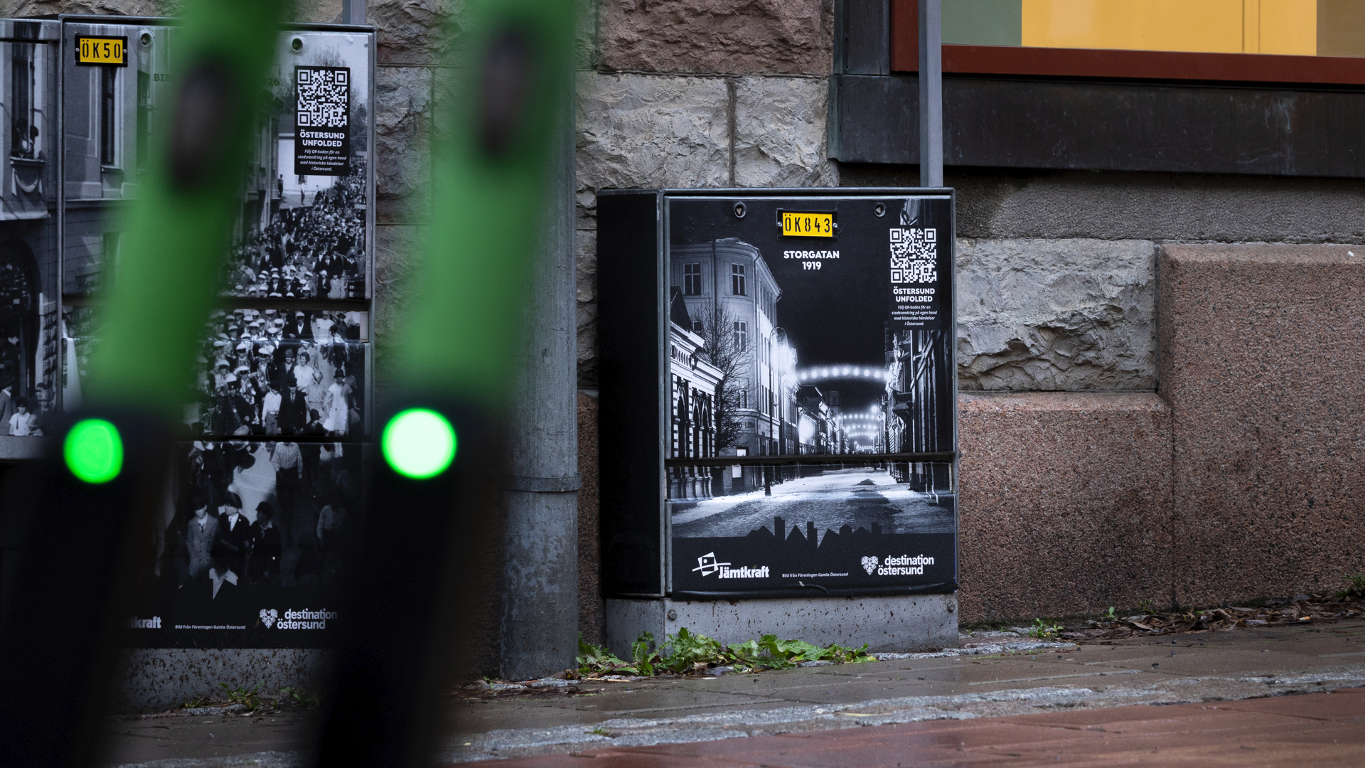 QR code on a building in Östersund for the walking tour